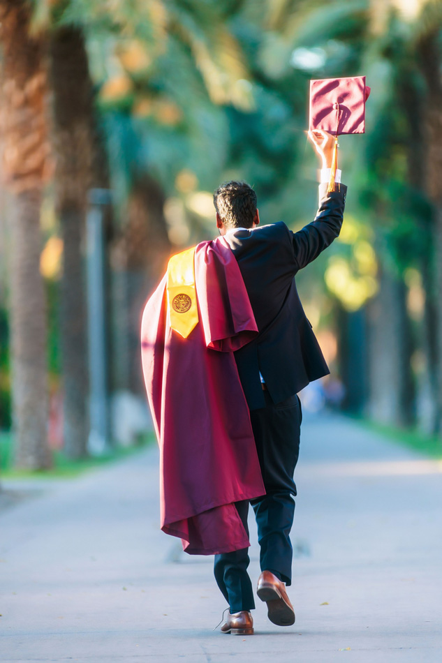 ASU graduate throwing cap